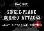 Immagine di B-24 kamikaze attaccano le raffinerie di petrolio e impianti di deposito Labuan Isola Borneo, 1944, secondo 1 filmato di repertorio 65675043293