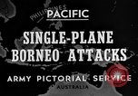 Immagine di B-24 kamikaze attaccano le raffinerie di petrolio e impianti di deposito Labuan Isola Borneo, 1944, secondo 3 filmato di repertorio 65675043293