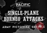 Immagine di B-24 kamikaze attaccano le raffinerie di petrolio e impianti di deposito Labuan Isola Borneo, 1944, secondo 7 filmato di repertorio 65675043293