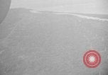 Immagine di B-24 kamikaze attaccano le raffinerie di petrolio e impianti di deposito Labuan Isola Borneo, 1944, secondo 18 filmato di repertorio 65675043293