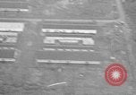 Immagine di B-24 kamikaze attaccano le raffinerie di petrolio e impianti di deposito Labuan Isola Borneo, 1944, secondo 22 filmato di repertorio 65675043293