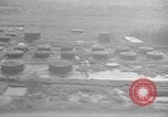 Immagine di B-24 kamikaze attaccano le raffinerie di petrolio e impianti di deposito Labuan Isola Borneo, 1944, secondo 35 filmato di repertorio 65675043293