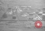 Immagine di B-24 kamikaze attaccano le raffinerie di petrolio e impianti di deposito Labuan Isola Borneo, 1944, secondo 37 filmato di repertorio 65675043293