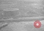 Immagine di B-24 kamikaze attaccano le raffinerie di petrolio e impianti di deposito Labuan Isola Borneo, 1944, secondo 41 filmato di repertorio 65675043293