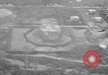 Immagine di B-24 kamikaze attaccano le raffinerie di petrolio e impianti di deposito Labuan Isola Borneo, 1944, secondo 42 filmato di repertorio 65675043293