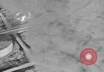 Immagine di B-24 kamikaze attaccano le raffinerie di petrolio e impianti di deposito Labuan Isola Borneo, 1944, secondo 62 filmato di repertorio 65675043293