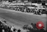 Image of 24 hours motorcycle race Spain, 1964, second 7 stock footage video 65675043300