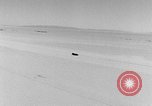 Standbild Sir Malcolm Campbell Bonneville Salt Flats Utah USA, 1935, aus Sekunde 54 historischem Filmmaterial Videoclip 65675043345