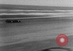 Standbild Sir Malcolm Campbell Daytona Beach Florida USA, 1935, aus Sekunde 25 historischem Filmmaterial Videoclip 65675043370