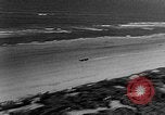 Standbild Sir Malcolm Campbell Daytona Beach Florida USA, 1935, aus Sekunde 31 historischem Filmmaterial Videoclip 65675043370