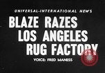 Image of Rug factory on fire Los Angeles California USA, 1955, second 14 stock footage video 65675043377