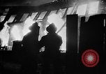 Image of Rug factory on fire Los Angeles California USA, 1955, second 38 stock footage video 65675043377