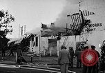 Image of Rug factory on fire Los Angeles California USA, 1955, second 43 stock footage video 65675043377