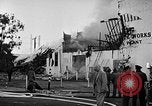 Image of Rug factory on fire Los Angeles California USA, 1955, second 44 stock footage video 65675043377