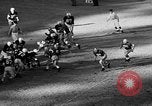 Standbild Fußballspiel Chapel Hill North Carolina USA, 1955, aus Sekunde 59 historischem Filmmaterial Videoclip 65675043382