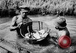 Standbild Fischzucht Niederländisch Guayana, 1957, aus Sekunde 24 historischem Filmmaterial Videoclip 65675043389
