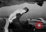 Image of Donald Campbell United Kingdom, 1957, second 7 stock footage video 65675043393