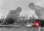 Image of Hitler Youth at beach Poland, 1940, second 1 stock footage video 65675043398