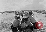 Image of Hitler Youth at beach Poland, 1940, second 18 stock footage video 65675043398
