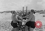Image of Hitler Youth at beach Poland, 1940, second 19 stock footage video 65675043398