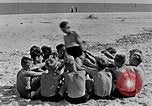 Image of Hitler Youth at beach Poland, 1940, second 26 stock footage video 65675043398