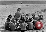 Image of Hitler Youth at beach Poland, 1940, second 27 stock footage video 65675043398