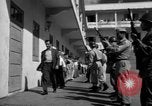 Image of Nationalist sympathizers rounded up San Juan Puerto Rico, 1950, second 16 stock footage video 65675043411