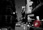 Image of Narrow crowded commercial street Puerto Rico, 1950, second 4 stock footage video 65675043413