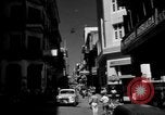 Image of Narrow crowded commercial street Puerto Rico, 1950, second 5 stock footage video 65675043413