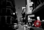 Image of Narrow crowded commercial street Puerto Rico, 1950, second 7 stock footage video 65675043413