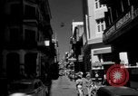Image of Narrow crowded commercial street Puerto Rico, 1950, second 9 stock footage video 65675043413