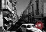 Image of Narrow crowded commercial street Puerto Rico, 1950, second 19 stock footage video 65675043413