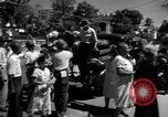 Image of Narrow crowded commercial street Puerto Rico, 1950, second 35 stock footage video 65675043413