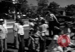 Image of Narrow crowded commercial street Puerto Rico, 1950, second 36 stock footage video 65675043413