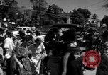 Image of Narrow crowded commercial street Puerto Rico, 1950, second 38 stock footage video 65675043413