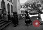 Image of Narrow crowded commercial street Puerto Rico, 1950, second 40 stock footage video 65675043413