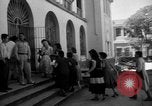Image of Narrow crowded commercial street Puerto Rico, 1950, second 41 stock footage video 65675043413