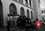 Image of Narrow crowded commercial street Puerto Rico, 1950, second 42 stock footage video 65675043413
