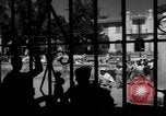 Image of Narrow crowded commercial street Puerto Rico, 1950, second 52 stock footage video 65675043413