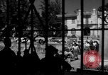 Image of Narrow crowded commercial street Puerto Rico, 1950, second 54 stock footage video 65675043413