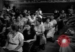 Image of Narrow crowded commercial street Puerto Rico, 1950, second 55 stock footage video 65675043413