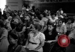 Image of Narrow crowded commercial street Puerto Rico, 1950, second 56 stock footage video 65675043413