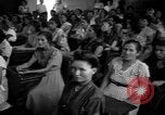 Image of Narrow crowded commercial street Puerto Rico, 1950, second 57 stock footage video 65675043413