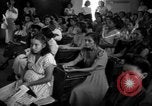 Image of Narrow crowded commercial street Puerto Rico, 1950, second 59 stock footage video 65675043413