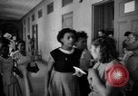 Image of Narrow crowded commercial street Puerto Rico, 1950, second 61 stock footage video 65675043413
