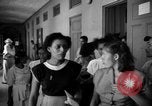 Image of Narrow crowded commercial street Puerto Rico, 1950, second 62 stock footage video 65675043413