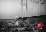 Image of Tacoma Narrows bridge collaps Tacoma Washington USA, 1940, second 21 stock footage video 65675043465