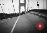 Image of Tacoma Narrows bridge collaps Tacoma Washington USA, 1940, second 37 stock footage video 65675043465