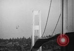 Image of Tacoma Narrows bridge collaps Tacoma Washington USA, 1940, second 45 stock footage video 65675043465