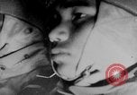 Standbild japanische Fallschirmjäger angreifenden Palembang in Niederländisch Ostindien Palembang Dutch East Indies, 1942, aus Sekunde 51 historischem Filmmaterial Videoclip 65675043483